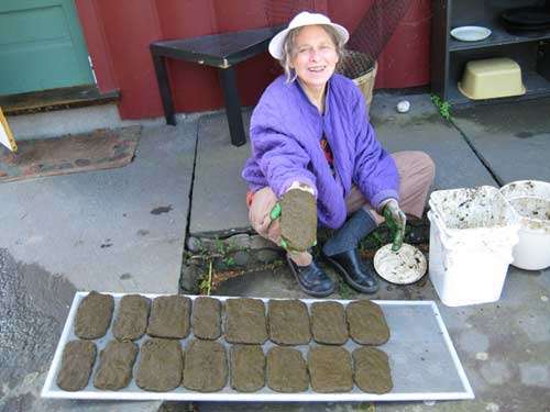 agnihotra, lining up the cakes and rying them in the sun