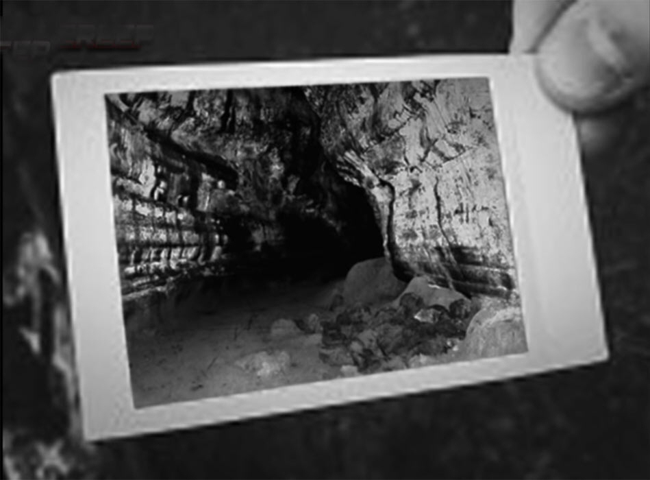 picture of the cave, Reptilian is in the back to the right