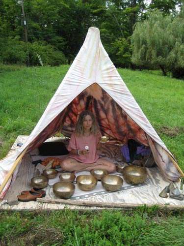 Carol playing singing bowls